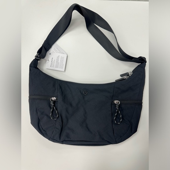 lululemon athletica Handbags - LuluLemon Slouchy Sling Bag 6L in Black